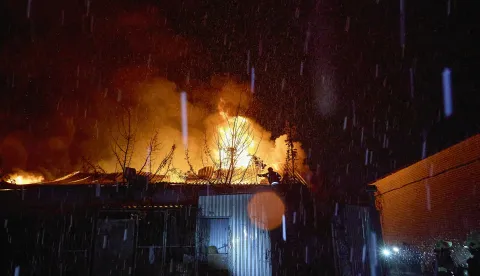 epa11869619 Emergency services at the site of a drone strike on a civil factory in Kharkiv, Ukraine, 02 February 2025 amid the ongoing Russian invasion. Nobody was injured in the attack, according to the State Emergency Service report. EPA/SERGEY KOZLOV