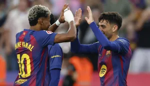 epa12462304 FC Barcelona's Pedri celebrates with teammate Lamine Yamal (L) after scoring the 1-0 goal during the Spanish LaLiga soccer match between FC Barcelona and Girona FC, in Barcelona, Spain, 18 October 2025. EPA/Alberto Estevez