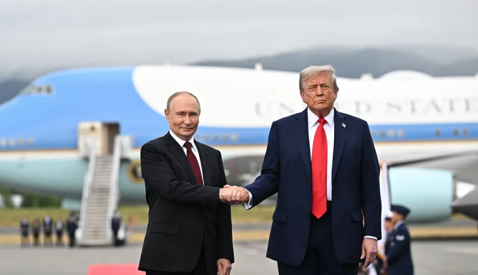 epa12303527 US President Donald Trump (R) and Russian President Vladimir Putin pose on a podium on the tarmac after they arrived to attend a meeting at Joint Base Elmendorf-Richardson in Anchorage, Alaska, USA, 15 August 2025. EPA/SERGEY BOBYLEV/SPUTNIK/KREMLIN POOL/POOL MANDATORY CREDIT