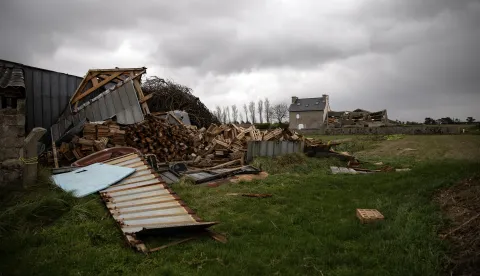 epa10955201 Damage is seen on a property after the passing of storm Ciaran in Kerlouan, in the Finistere department of Brittany, northwestern France, 02 November 2023. A red alert for high winds and flooding was issued for the Finistere department as storm Ciaran battered north-west France. French Interior Minister Gerald Darmanin said that at least one person has died in France, and at least 16 others were injured, including seven firefighters. EPA/VINCENT FEURAY