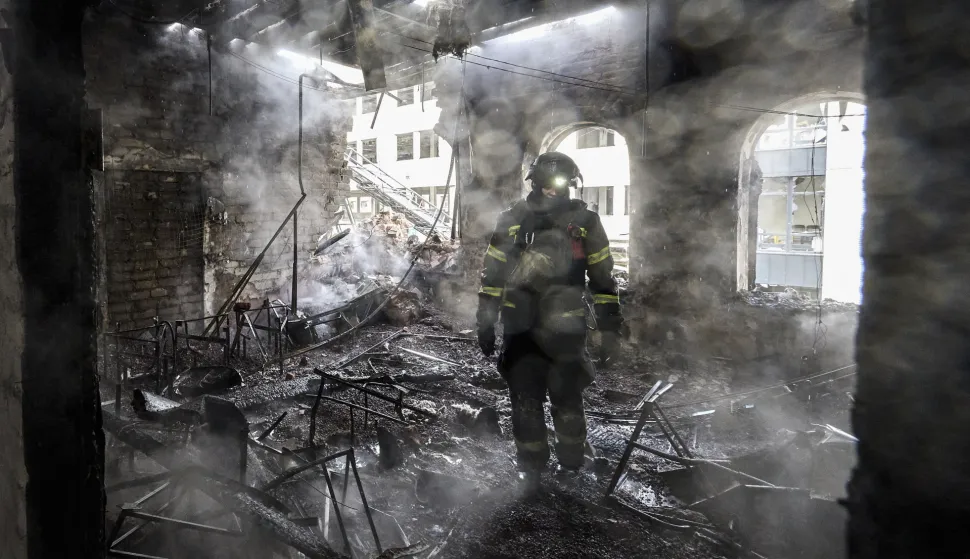 epa12472407 Ukrainian rescuers work at the site of a Russian strike on a kindergarten in Kharkiv, northeastern Ukraine, 22 October 2025, amid the Russian invasion. At least one person was killed and six others injured after Russian strikes hit a kindergarten in Kharkiv, according to the head of the Kharkiv Military Administration, Oleg Synegubov. The 48 children and teachers were safely evacuated to a shelter in the same building. Across Ukraine, the attacks killed at least seven people, including two children, with regions including Kyiv, Odesa, Chernihiv, Dnipropetrovsk, Kirovohrad, Poltava, Vinnytsia, Zaporizhia, Cherkasy, and Sumy affected, according to President Zelensky. EPA/SERGEY KOZLOV
