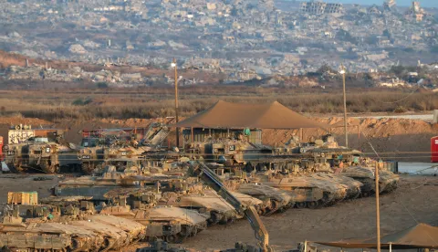 epa12469121 Israeli tanks gathered at an undisclosed location near the border with the Gaza Strip in southern Israel, 21 October 2025. As part of an Israel-Hamas ceasefire agreement, the Israeli military partially withdrew from Gaza on 10 October. EPA/ATEF SAFADI