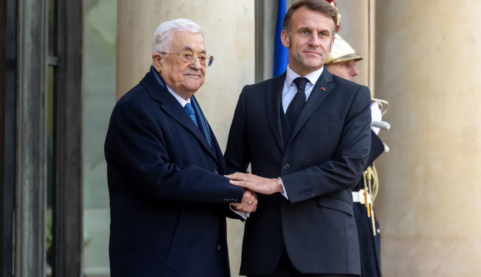 epa12518653 French President Emmanuel Macron (R) meets with President of the Palestinian National Authority Mahmoud Abbas (L) at the Elysee Presidential Palace in Paris, France, 11 November 2025. EPA/CHRISTOPHE PETIT TESSON