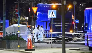epa12526318 Police technicians at the the scene of a bus crash into a bus shelter in Ostermalm, Stockholm, Sweden, 14 November 2025. The incident has left several people injured and hospitalized, with police confirming multiple fatalities. EPA/Claudio Bresciani/TT SWEDEN OUT