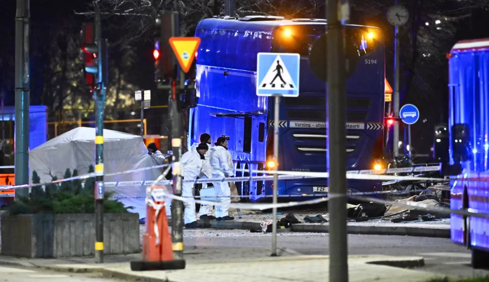 epa12526318 Police technicians at the the scene of a bus crash into a bus shelter in Ostermalm, Stockholm, Sweden, 14 November 2025. The incident has left several people injured and hospitalized, with police confirming multiple fatalities. EPA/Claudio Bresciani/TT SWEDEN OUT