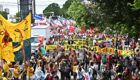 epa12527983 People join the Global Climate March in Belem, Brazil, 15 November 2025, calling on governments to protect forests, uphold indigenous rights, and take global climate action during the COP30 summit. EPA/ANDRE BORGES