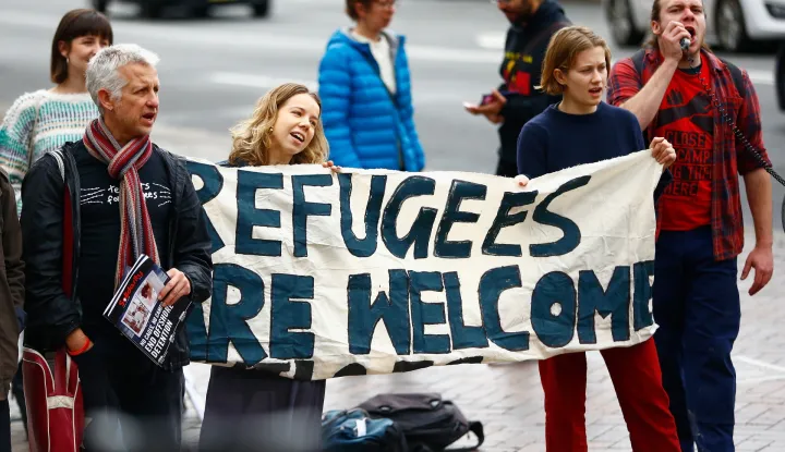epa06915224 Police are seen at the Law Courts during the 'No to Dutton's White Australia Racism, Welcome Refugees' Protest in Sydney, New South Wales, Australia, 28 July 2018. Activists demonstrated against Immigration minister Peter Dutton's policies and practices related to border protection and immigration detention. EPA/JEREMY NG AUSTRALIA AND NEW ZEALAND OUT
