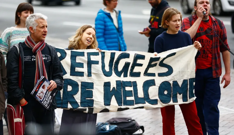 epa06915224 Police are seen at the Law Courts during the 'No to Dutton's White Australia Racism, Welcome Refugees' Protest in Sydney, New South Wales, Australia, 28 July 2018. Activists demonstrated against Immigration minister Peter Dutton's policies and practices related to border protection and immigration detention. EPA/JEREMY NG AUSTRALIA AND NEW ZEALAND OUT