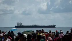 epaselect epa12528731 People take part in a swearing-in ceremony for Bolivarian Base Committees (CBBI) in Maracaibo, Venezuela, 15 November 2025. Venezuelan President Nicolas Maduro and leading figures of Chavismo have taken to the streets across the country amid escalating tensions with the United States following Washington?s announcement of Operation Southern Spear, which the US says is aimed at combating drug trafficking originating in Latin America, three months after the start of a US military deployment in the Caribbean. EPA/Henry Chirinos