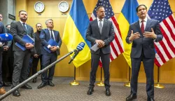 epa12544576 Head of the Office of the President of Ukraine Andriy Yermak (C), and US Secretary of State Marco Rubio (R), talk to the press as their consultations continue on the Trump peace plan at the US Mission in Geneva, Switzerland, 23 November 2025. US and Ukraine officials are expected to meet in Geneva on 23 November to discuss the US president's peace plan aimed at ending the war with Russia. EPA/MARTIAL TREZZINI