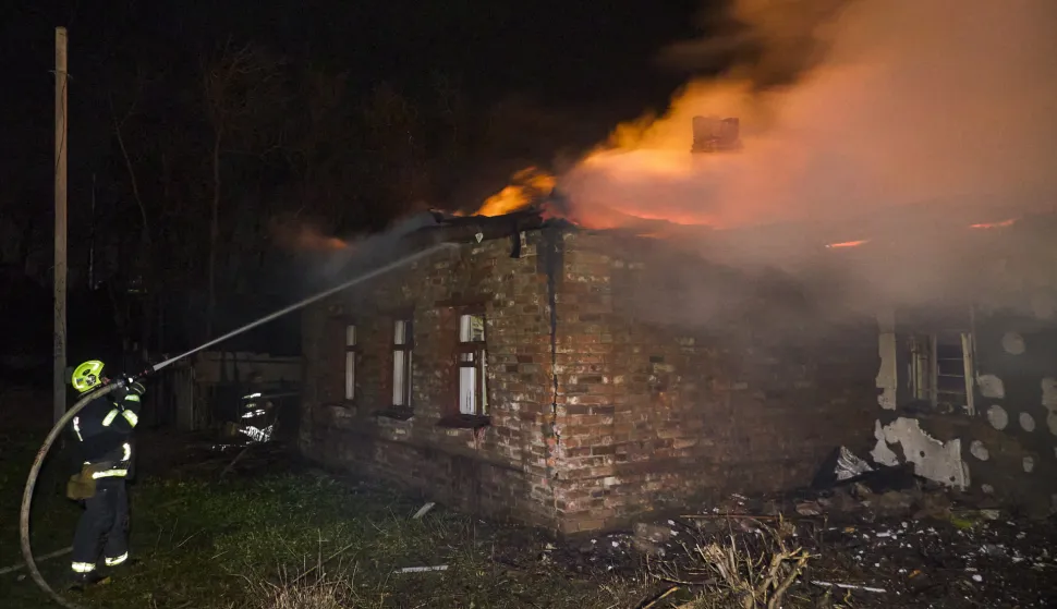 epaselect epa12545225 Ukrainian rescuers work at the site of a Russian strike on a residential area in Kharkiv, northeastern Ukraine, 24 November 2025, amid the Russian invasion. At least four people were killed and dozens injured, including two children, after overnight Russian strikes in Kharkiv, the head of the Kharkiv Military Administration, Oleg Synegubov, reported. EPA/SERGEY KOZLOV