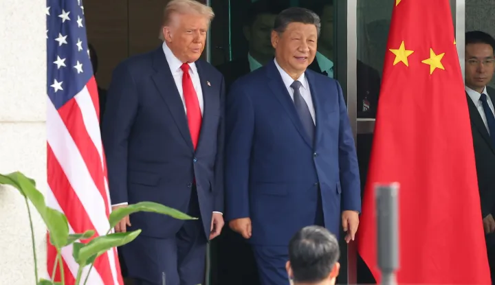 epa12492356 US President Donald Trump (L) and Chinese President Xi Jinping (C) emerge from their talks at the Naraemaru reception hall inside an Air Force base in Busan, South Korea, 30 October 2025. EPA/YONHAP SOUTH KOREA OUT
