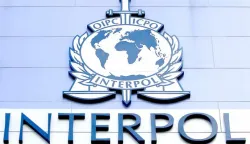 epa05018137 (FILE) A file photo dated 14 April 2015 of the 'Interpol' on a facade of the Interpol Global Complex for Innovation building (IGCI) in Singapore. Media reports on 09 November 2015 state that Interpol - based in Lyon, France - is to lead a global investigation into an alleged international corruption scam involving athletes and officials. Interpol's announcement followed a news conference in which an independent commission set up by the World Anti-Doping Agency (WADA) published a damning report on the Russian athletics federation for the use of systematic doping. EPA/WALLACE WOON