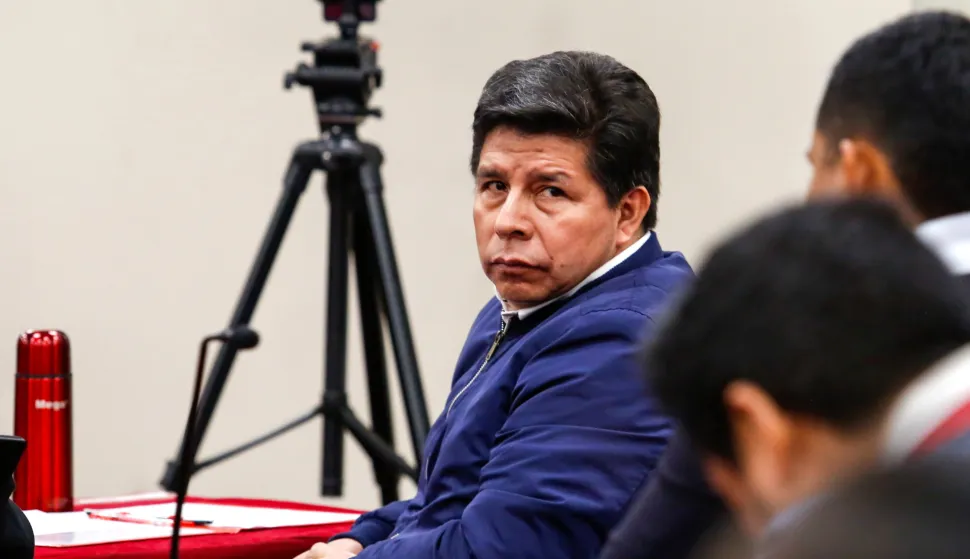 epa12552707 Former Peruvian President Pedro Castillo reacts during a hearing at the Special Criminal Chamber of the Supreme Court in Lima, Peru, 27 November 2025. Castillo listens in open court to the reading of the sentence handed down by the court that tried him for the failed coup attempt in 2022. The sentence faces him with a request from the prosecution for up to 34 years in prison for rebellion and conspiracy. EPA/RENATO PAJUELO
