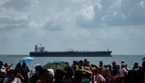 epaselect epa12528731 People take part in a swearing-in ceremony for Bolivarian Base Committees (CBBI) in Maracaibo, Venezuela, 15 November 2025. Venezuelan President Nicolas Maduro and leading figures of Chavismo have taken to the streets across the country amid escalating tensions with the United States following Washington?s announcement of Operation Southern Spear, which the US says is aimed at combating drug trafficking originating in Latin America, three months after the start of a US military deployment in the Caribbean. EPA/Henry Chirinos