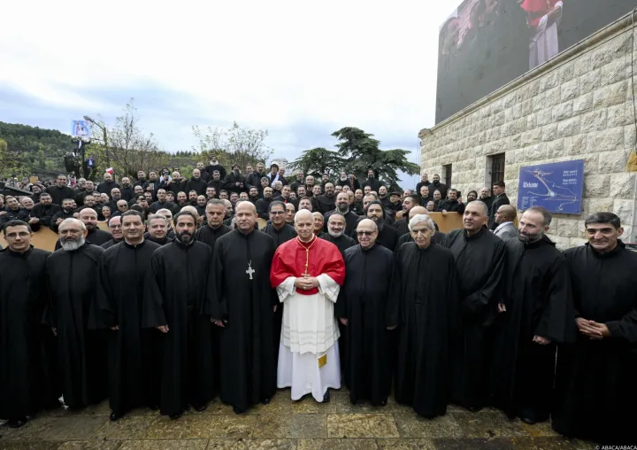 Pope Leo poses with the monks at the Monastery of St. Maroun in Annaya, Lebanon on December 1, 2025, after a prayer at the tomb of Saint Charbel Makhlouf, during the second day of his Apostolic visit to Lebanon. Canonized in 1977, this Lebanese Maronite monk and hermit lived from 1828 to 1898 and led a life of extreme asceticism. During his life, he obtained a wide reputation for holiness, and for his ability to unite Christians, Muslims and Druze. He is known among Lebanese Christians as the 'Miracle Monk of Lebanon. Photo by (EV) Vatican Media/ABACAPRESS.COM Photo: ABACA/ABACA