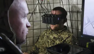 epa12440289 A handout picture made available by the press service of the 65th Separate Mechanised Brigade of Ukrainian Armed Forces shows the pilot of an air defense crew controls an interceptor drone from their position in the Zaporizhzhia region, Ukraine, 08 October 2025, amid the ongoing Russian invasion. Ukrainian interceptor drones work against different Russian drones the such as reconnaissance drones, FPV, and others, which are the main threat to military and civilians on the territory close to the frontline. EPA/Press service of the 65th Mechanized Brigade/HANDOUT HANDOUT EDITORIAL USE ONLY/NO SALES