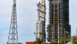 epa12234306 The Tianzhou-9 cargo craft, tasked with carrying supplies to China's space station, and a Long March-7 carrier rocket being vertically transferred to the launch site in Wenchang Spacecraft Launch Site in Wenchang, south China's Hainan Province, 12 July 2025. The cargo spacecraft will be launched in the near future at an appropriate time, according to the China Manned Space Agency (CMSA). Currently, the facilities and equipment at the Wenchang Spacecraft Launch Site in the southern island province of Hainan are in good condition, and comprehensive functionality checks and joint tests are scheduled to proceed as planned ahead of the launch, said the CMSA. EPA/XINHUA/Yang Guanyu CHINA OUT/UK AND IRELAND OUT/  MANDATORY CREDIT EDITORIAL USE ONLY