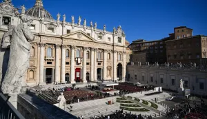 epa12111717 Faithful wait for the Inauguration Mass of Pope Leo XIV in front of the dome in St. Peter's Square, Vatican City, 18 May 2025. EPA/DAREK DELMANOWICZ POLAND OUT