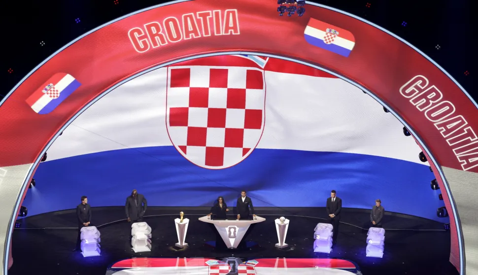 epa12572840 The colours of Croatia appear on the stage during the FIFA World Cup 2026 Final Draw at the Kennedy Center in Washington DC, USA, 05 December 2025. EPA/SHAWN THEW