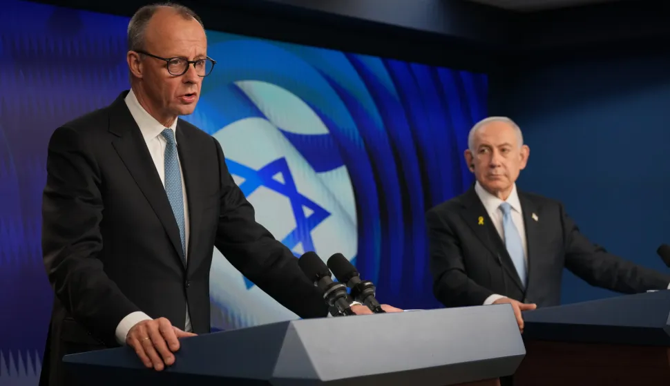 epa12576670 German Chancellor Friedrich Merz and Israeli Prime Minister Benjamin Netanyahu (R) address a joint press conference in Jerusalem, 07 December 2025. This is Merz's first visit to Israel in his capacity as German Federal Chancellor. EPA/ARIEL SCHALIT/POOL