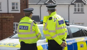 epa06865099 Police officers stand outside the house where Dawn S. and Charlie R. were found unconscious on Saturday night, in Amesbury, Britain, 05 July 2018. Charlie R. and his partner Dawn S. had allegedly being exposed to the nerve agent Novichok. EPA/RICK FINDLER
