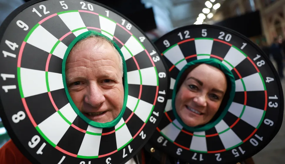 epa12587244 Fans dress in costume as they attend the World Darts Championships at Alexandra Palace in London London, Britain, 12 December 2025. The sporting event runs from 11 December 2025 to 03 January 2026. EPA/NEIL HALL