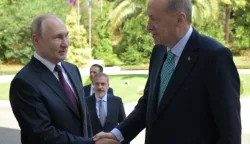 epa10839844 Russian President Vladimir Putin (L) welcomes Turkey's President Recep Tayyip Erdogan (R) prior to their meeting in Sochi, Russia, 04 September 2023. Putin said that Russia is open to negotiations on the 'grain deal'. EPA/ALEKSEY NIKOLSKYI/SPUTNIK/KREMLIN POOL MANDATORY CREDIT