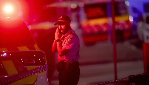epa12591108 A police officer near the scene following a shooting incident at Bondi Beach, in Sydney, New South Wales (NSW), Australia, 14 December 2025. NSW Police confirmed at least ten deaths, including one alleged shooter, following the incident at Bondi Beach. Eleven others were injured, including two police officers. Authorities said the second alleged shooter remains in critical condition and is in custody. EPA/JEREMY PIPER AUSTRALIA AND NEW ZEALAND OUT