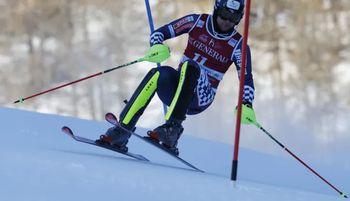 epa12590919 Samuel Kolega of Croatia in action during the 1st run of the Men's Slalom race at the FIS Alpine Skiing World Cup in Val d'Isere, France, 14 December 2025. EPA/SEBASTIEN NOGIER