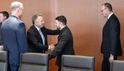 epa12592012 A handout photo made available by the German government press office shows German Chancellor Friedrich Merz (R) looking on as Ukrainian President Volodymyr Zelensky (2-R) greets US Presidential Envoy Steve Witkoff (3-R) of the US delegation at the beginning of their meeting in the Chancellery, in Berlin, Germany, 14 December 2025. Berlin will host US and Ukrainian delegations over the weekend for talks on a proposed peace plan, including a possible ceasefire in Ukraine. The discussions will be followed by a summit in Berlin with European leaders and President Volodymyr Zelensky. EPA/Guido Bergmann/German government press office HANDOUT HANDOUT EDITORIAL USE ONLY/NO SALES