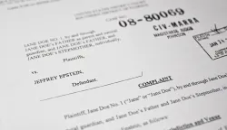 This photo illustration taken in Washington, DC, on December 19, 2025 shows a court document after the US Justice Department began releasing the long-awaited records from the investigation into the politically explosive case of convicted sex offender Jeffrey Epstein. (Photo by Mandel NGAN/AFP)