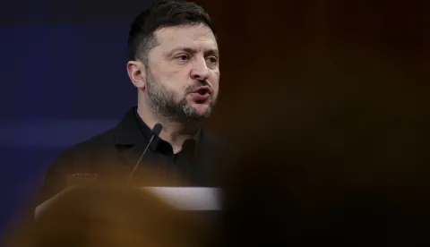 epa12594388 Ukrainian President Volodymyr Zelensky speaks during the 8th German-Ukrainian Economic Forum at the House of German Economy in Berlin, Germany, 15 December 2025. Berlin hosts US and Ukrainian delegations for talks on a proposed peace plan, including a possible ceasefire in Ukraine. EPA/HANNIBAL HANSCHKE