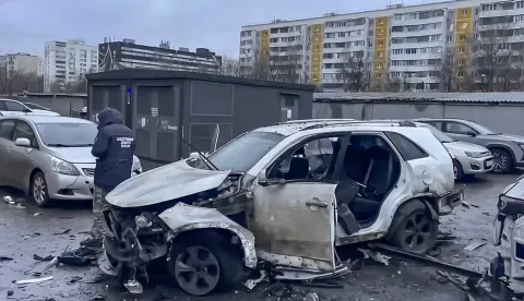 epa12608271 A handout still image taken from a video provided by the Russian Investigative Committee press service shows a Russian investigator working near a destroyed car following a blast from an explosive device planted under the vehicle in a residential area of Moscow, Russia, 22 December 2025. The head of the Russian General Staff's Operational Training Directorate, Lt. Gen. Fanil Sarvarov, was killed in a car explosion in Moscow, the Russian Investigative Committee reported. EPA/RUSSIAN INVESTIGATIVE COMMITTEE HANDOUT BEST QUALITY AVAILABLE HANDOUT EDITORIAL USE ONLY/NO SALES