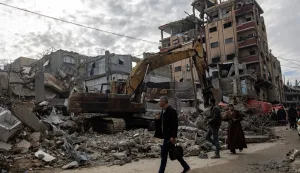 epa12604733 Members of the Palestinian Civil Defense remove the rubble of a destroyed home as they search for the bodies of Palestinians killed during the conflict in Khan Younis, southern Gaza Strip, 20 December 2025. The Civil Defence in the Gaza Strip is carrying out operations to recover the bodies of Palestinians buried beneath the rubble of homes destroyed during Israeli strikes on Gaza, estimating that nearly 100 bodies remain unrecovered. More than 70,000 Palestinians have been killed in the Gaza Strip since October 2023, according to the Palestinian Ministry of Health, and about 1,200 Israelis have been killed since the launch of an Israeli military campaign in response to a cross-border attack by Hamas on 07 October 2023. EPA/HAITHAM IMAD