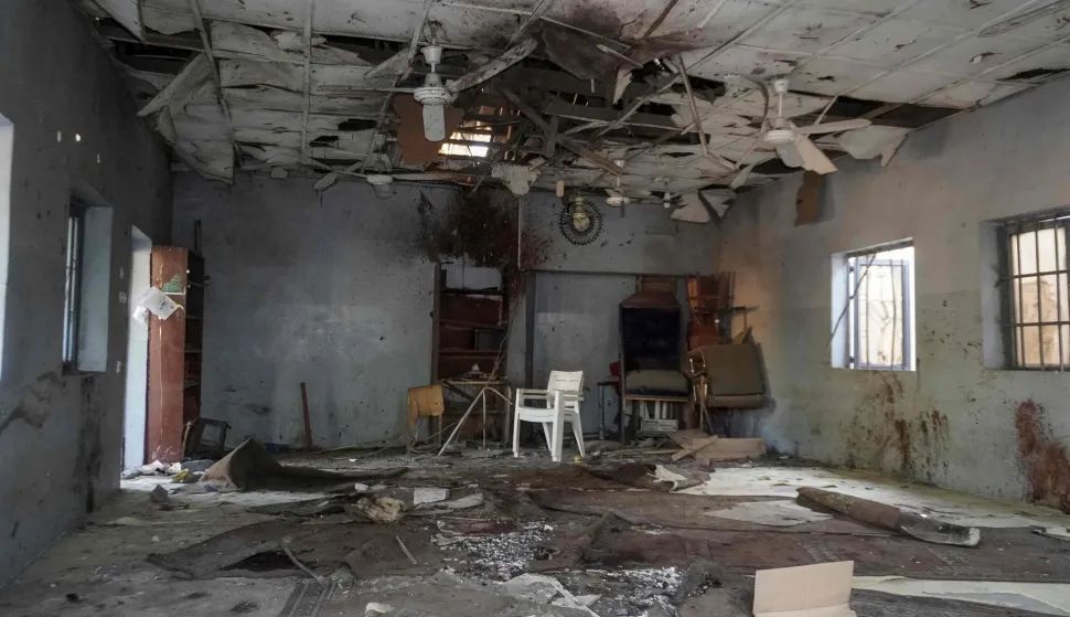 EDITORS NOTE: Graphic content/TOPSHOT - A general view of the scene of the explosion at a mosque in the Gamboru market in Maiduguri on December 25, 2025. An explosion ripped through a mosque in the northeastern Nigerian city of Maiduguri and killed at least seven worshippers on December 24, 2025, witnesses and security sources told AFP.No armed groups immediately claimed responsibility for what anti-jihadist militia leader Babakura Kolo said was a suspected bombing.Maiduguri is the capital of Borno state, home to a years-long insurgency by jihadist groups Boko Haram and an offshoot, Islamic State West Africa Province, though the city itself has not seen a major attack in years. (Photo by Audu MARTE/AFP)