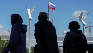 epa10206094 People stand in line during voting in a referendum on the joining of Russian-controlled regions of Ukraine to Russia, at an outdoor polling station in Mariupol, eastern Ukraine, 25 September 2022. From 23 to 27 September, residents of the self-proclaimed Luhansk and Donetsk People's Republics as well as the Russian-controlled areas of the Kherson and Zaporizhzhia regions of Ukraine vote in a referendum to join the Russian Federation. On 24 February 2022 Russian troops entered the Ukrainian territory in what the Russian president declared a 'Special Military Operation', starting an armed conflict that has provoked destruction and a humanitarian crisis. EPA/STRINGER