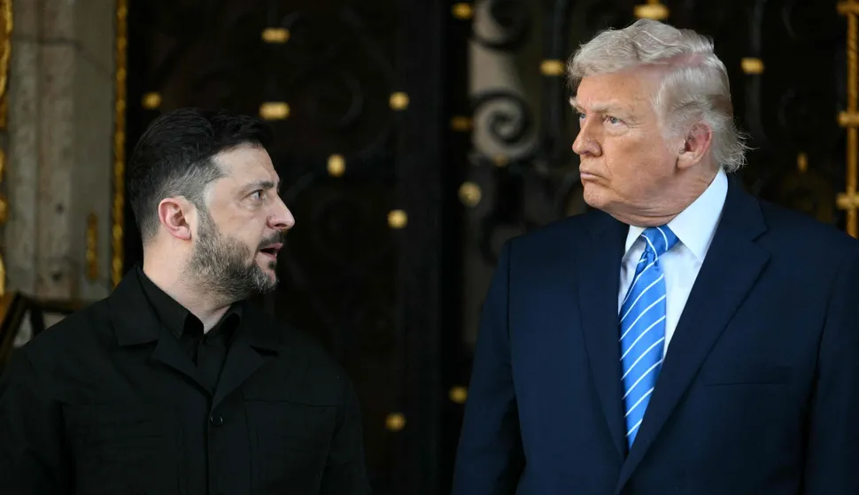 US President Donald Trump welcomes Ukranian President Volodymyr Zelensky at his Mar-a-Lago residence in Palm Beach, Florida, on December 28, 2025. (Photo by Jim WATSON/AFP)