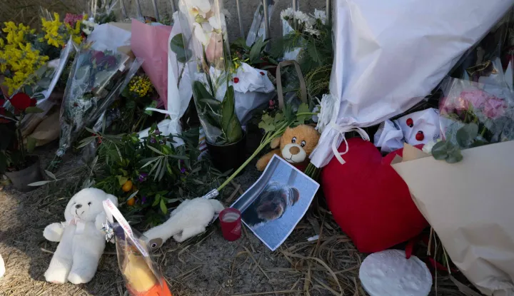 Photographs, plush toys and flowers displayed on barriers at the entrance of "La Madrague" house, property of late Brigitte Bardot in Saint-Tropez, southeastern France on December 29, 2025. French film legend Brigitte Bardot died at 91 AFP learnt from Bardot foundation on December 28, 2025. (Photo by MIGUEL MEDINA/AFP)