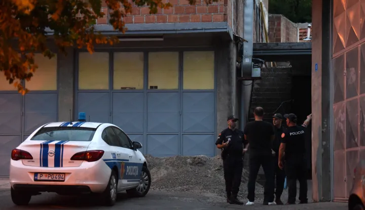 epa10117916 Police officers close off the crime scene at Cetinje, Montenegro, 12 August 2022. A 34 year old male in Montenegro went on a shooting rampage after a family dispute, killing at least 10 people on the street before being gunned down in an exchange of fire with the police. EPA/BORIS PEJOVIC