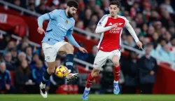 epa11870590 Kai Havertz of Arsenal (R) in action against Josko Gvardiol of Manchester City during the English Premier League match between Arsenal and Manchester City in London, Britain, 02 February 2025. EPA/DAVID CLIFF EDITORIAL USE ONLY. No use with unauthorized audio, video, data, fixture lists, club/league logos, 'live' services or NFTs. Online in-match use limited to 120 images, no video emulation. No use in betting, games or single club/league/player publications.