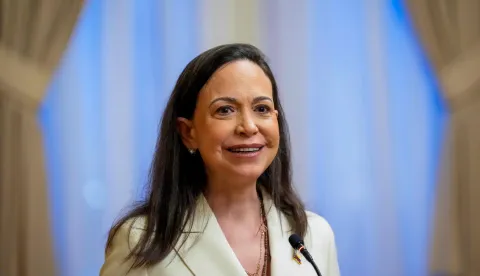 (FILES) Nobel Peace Prize winner Maria Corina Machado attends a press conference with the President of Norway's Parliament Storting (unseen) on December 11, 2025 at the Storting in Oslo. Venezuelan opposition leader Maria Corina Machado, who won the 2025 Nobel Peace Prize, has left Oslo, a member of her entourage said on December 17, 2025, without providing details of her whereabouts. (Photo by Ole Berg-Rusten/NTB/AFP)/Norway OUT