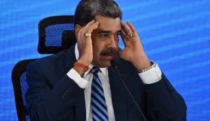(FILES) Venezuela's President Nicolas Maduro gestures during the Meeting of Jurists in Defense of International Law at the Eurobuilding Hotel in Caracas on November 14, 2025. In an interview on January 1, 2026, Venezuelan President Nicol?s Maduro avoided confirming or denying an alleged attack on a narcotics facility that, according to Donald Trump, the United States recently carried out on Venezuelan territory. (Photo by Federico PARRA/AFP)