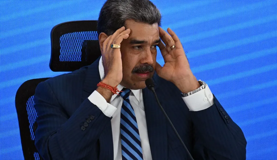 (FILES) Venezuela's President Nicolas Maduro gestures during the Meeting of Jurists in Defense of International Law at the Eurobuilding Hotel in Caracas on November 14, 2025. In an interview on January 1, 2026, Venezuelan President Nicol?s Maduro avoided confirming or denying an alleged attack on a narcotics facility that, according to Donald Trump, the United States recently carried out on Venezuelan territory. (Photo by Federico PARRA/AFP)
