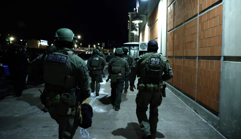 Armed police officers arrive at the Metropolitan Detention facility in the Brooklyn borough of New York, where ousted president Nicolas Maduro is expected to be held, on January 3, 2026 in New York City. President Donald Trump said January 3 that the United States will "run" Venezuela and tap its huge oil reserves after seizing leftist leader Nicolas Maduro during a bombing raid on Caracas.Trump's announcement came hours after a lightning pre-dawn attack in which special forces grabbed Maduro and his wife -- while air strikes pounded sites in and around the capital city -- then whisked him out of the country. (Photo by John Lamparski/AFP)