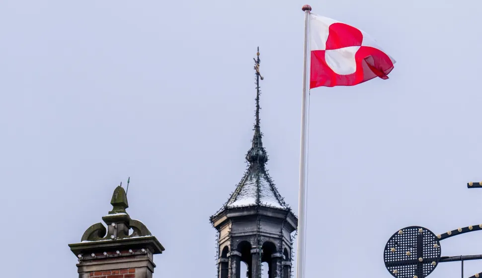 The Greenlandic flag (Erfalasorput) flies on the roof of Tivoli Castle in Copenhagen, on January 8, 2026. US President Donald Trump is discussing options including military action to take control of Greenland, the White House said on January 6, 2025, upping tensions that Denmark warns could destroy the NATO alliance. Trump has stepped up his designs on the mineral-rich, self-governing Danish territory in the arctic since the US military seized Venezuelan leader Nicolas Maduro on January 3, 2026. (Photo by Ida Marie Odgaard/Ritzau Scanpix/AFP)/Denmark OUT