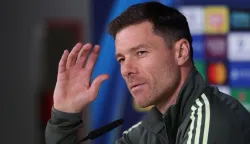 (FILES) Real Madrid's Spanish coach Xabi Alonso gestures as he gives a press conference at Valdebebas training grounds in Madrid on December 9, 2025 on the eve of their Champions League football match against Manchester City. Real Madrid said on January 12, 2026 that coach Xabi Alonso has left the club by mutual consent, a day after the team lost the Spanish Super Cup final against rivals Barcelona. (Photo by Pierre-Philippe MARCOU/AFP)