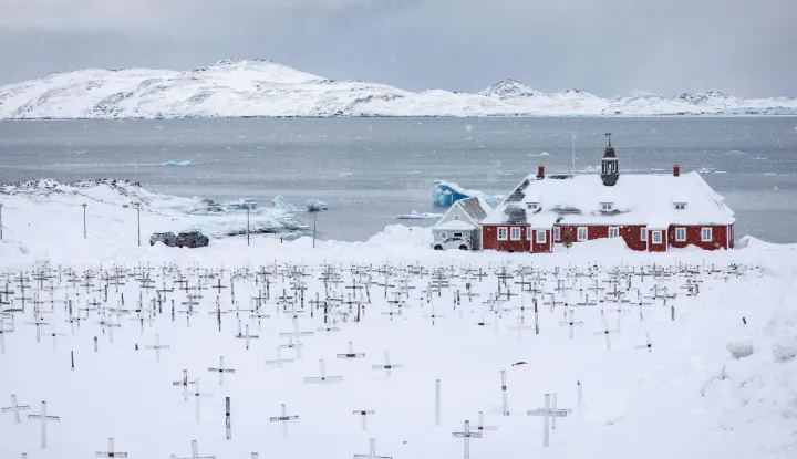 (FILES) Crosses at the cemetery are covered in snow in Nuuk, Greenland, on March 7, 2025. US President Donald Trump is discussing options including military action to take control of Greenland, the White House said on January 6, 2025, upping tensions that Denmark warns could destroy the NATO alliance. Trump has stepped up his designs on the mineral-rich, self-governing Danish territory in the arctic since the US military seized Venezuelan leader Nicolas Maduro on January 3, 2026. (Photo by Odd ANDERSEN/AFP)