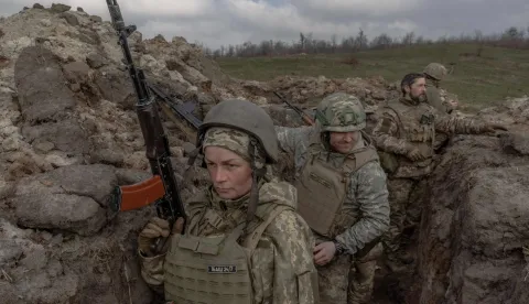 AFP PICTURES OF THE YEAR 2025Natalia, 51, a mother of three, serving as a combat medic in the 24th Mechanized Brigade takes part in a field training exercise in an undisclosed location in the eastern region of Ukraine, on March 18, 2025, amid the Russian invasion of Ukraine. (Photo by Roman PILIPEY/AFP)/AFP PICTURES OF THE YEAR 2025