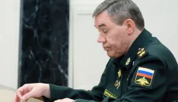 In this pool photograph distributed by the Russian state agency Sputnik, Chief of the General Staff Valery Gerasimov attends a meeting on situation in the zone of the "special military operation", the Kremlin's term for the nearly four-year-long Ukraine offensive, chaired by Russia's President, in Moscow on December 29, 2025. (Photo by Mikhail METZEL/POOL/AFP)